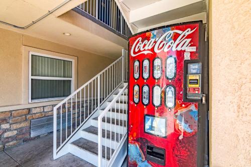 a cocacola vending machine in front of a building at Motel 6-Azle, TX in Azle