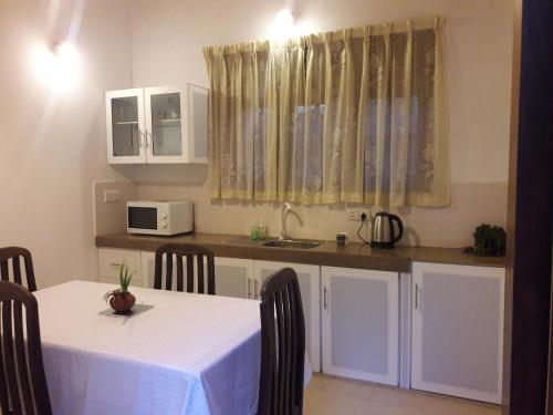 Kuhinja ili čajna kuhinja u objektu Sisanda Residence