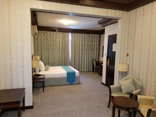 Postel nebo postele na pokoji v ubytování Verona Resorts Sharjah