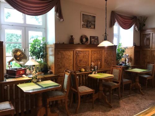 
Ein Restaurant oder anderes Speiselokal in der Unterkunft Hotel am Schloss - Frankfurt an der Oder 
