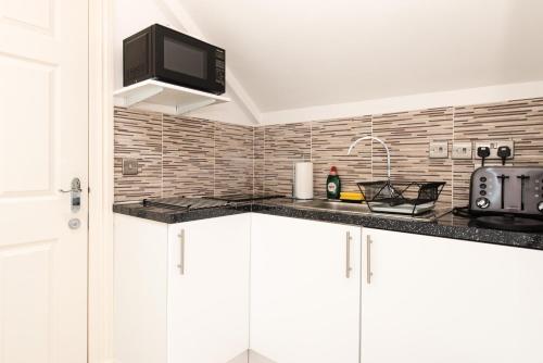 Dapur atau dapur kecil di Royal Princes Suites