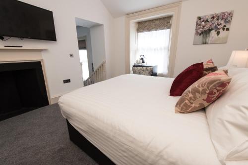 Katil atau katil-katil dalam bilik di Royal Princes Suites