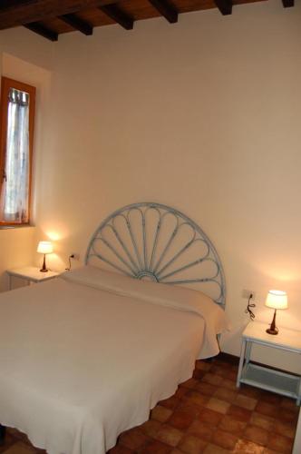 Letto o letti in una camera di Residential Hotel Villaggio Innamorata