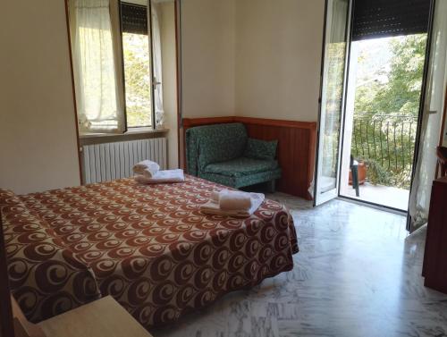 Un pat sau paturi într-o cameră la Albergo Di Piero
