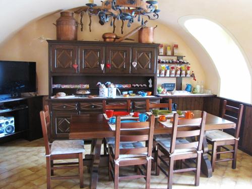 Kuchyň nebo kuchyňský kout v ubytování Il cuore dei Foresti