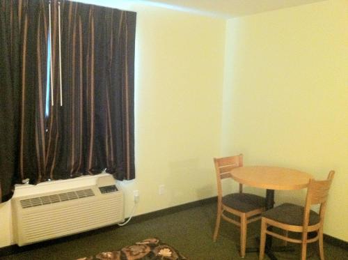 Postel nebo postele na pokoji v ubytování Circle 6 Motel