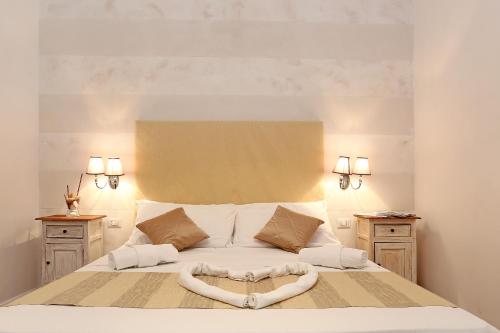 En eller flere senge i et værelse på Juno Pantheon