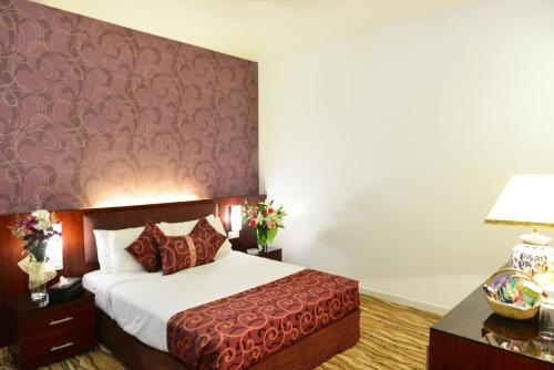 Katil atau katil-katil dalam bilik di Amazon Lilly Lake View Residence