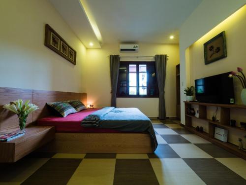 TV a/nebo společenská místnost v ubytování Hanoi Balcony Homestay