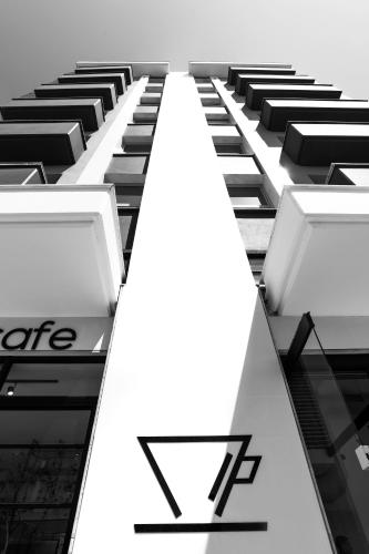 a black and white picture of a piano keyboard at White Luxury in Thessaloniki