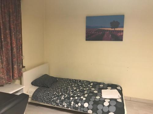 
A bed or beds in a room at Apartment Zaventem Brussels Airport J

