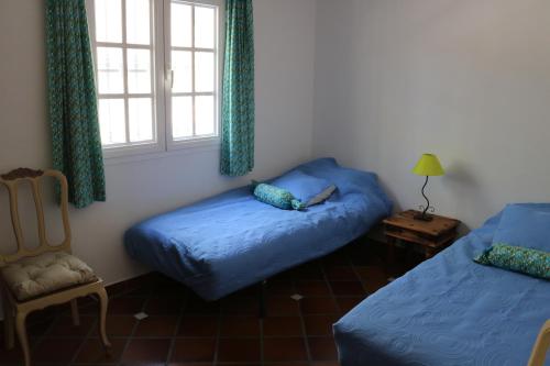 Postel nebo postele na pokoji v ubytování Casa los Almendros