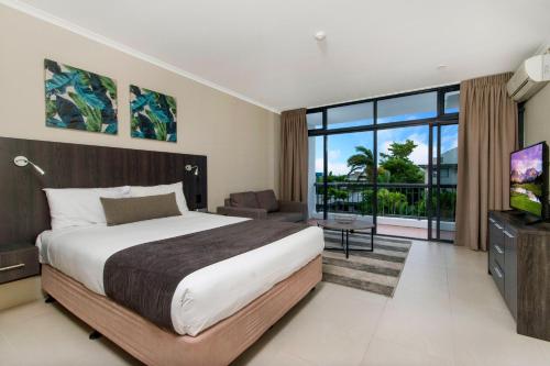 מיטה או מיטות בחדר ב-Sunshine Tower Hotel