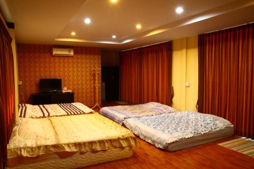 Tonnum Resort tesisinde bir odada yatak veya yataklar