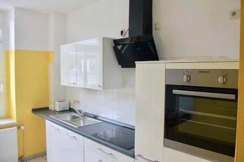 Cuisine ou kitchenette dans l'établissement stayINN Dresden