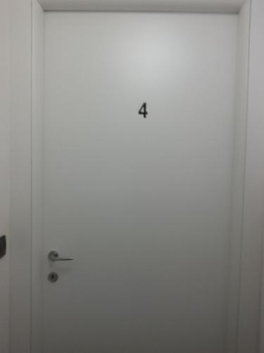 a door with the number four on it at Ciro BED AND BREAKFAST la villetta in Pioltello