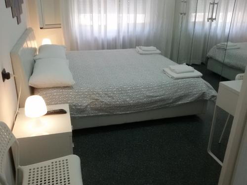 a bedroom with a bed with two white pillows at Ciro BED AND BREAKFAST la villetta in Pioltello