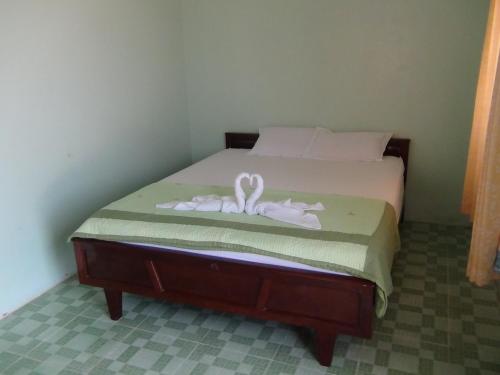 Katil atau katil-katil dalam bilik di Hong Di Guesthouse