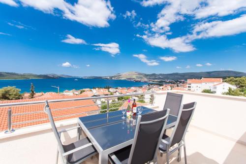a view from the balcony of a house with a table and chairs at Villa Anastasia in Trogir