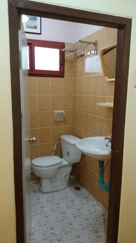 a bathroom with a toilet and a sink at Chantana House Ayutthaya in Phra Nakhon Si Ayutthaya