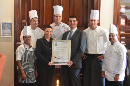 a group of chefs posing for a picture holding a plaque at The Landmark Hotel in Carrick on Shannon