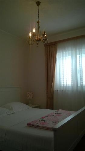 Postel nebo postele na pokoji v ubytování Apartments Vrisak