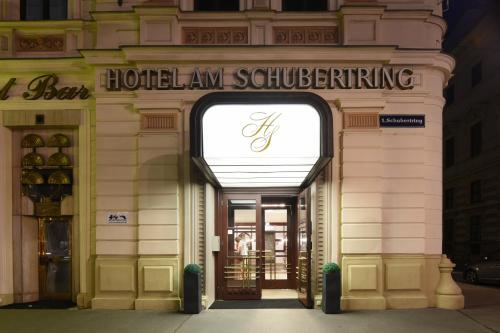 a building with the entrance to a hotel law officiating at Hotel Am Schubertring in Vienna