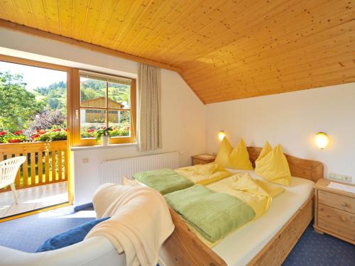 Postel nebo postele na pokoji v ubytování Haus Lindenkreuz