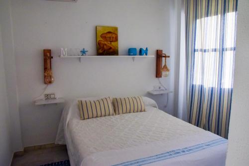 Postel nebo postele na pokoji v ubytování Vem Al Puerto De Santa Maria