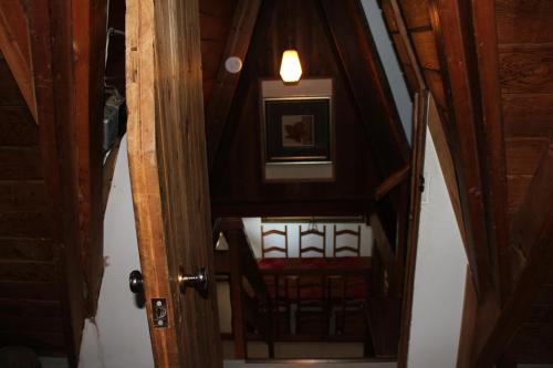 an overhead view of a room with a table and chairs at Sunny Bluffs Chalets in Kaslo