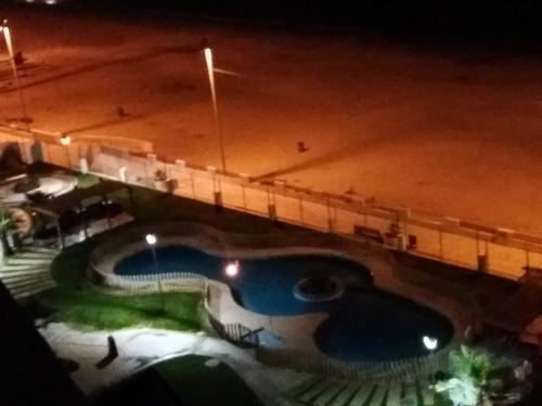 Bazén v ubytování Departamento en Playa La Herradura nebo v jeho okolí