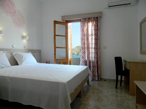 Кровать или кровати в номере Armyra Hotel