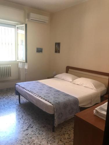 Кровать или кровати в номере Casa Commenda