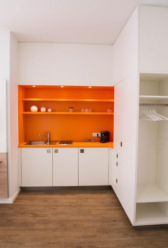 Η κουζίνα ή μικρή κουζίνα στο Boardinghouse am Teuto