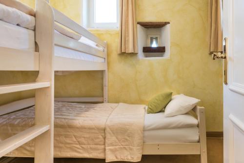 a bedroom with two bunk beds and a bed at Burg Heimerzheim in Swisttal