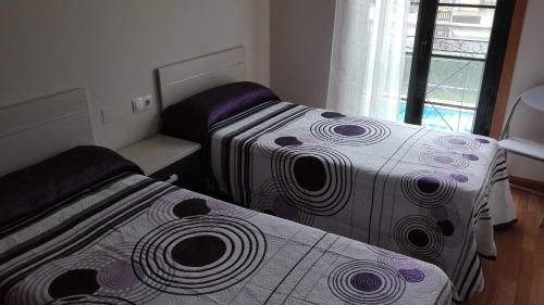 Posteľ alebo postele v izbe v ubytovaní Apartment Javier