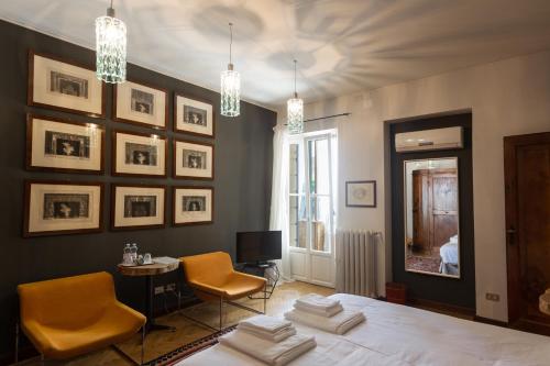Posteľ alebo postele v izbe v ubytovaní Palazzo Fracastoro