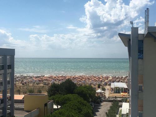 a view of a city and the ocean from a building at Hotel Ca' D'Oro Tre Stelle Superior Adults only in Bibione