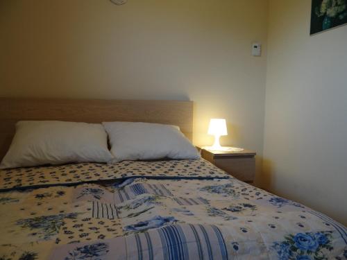 Posteľ alebo postele v izbe v ubytovaní Sentymentalne Kościelisko Apartament & SPA