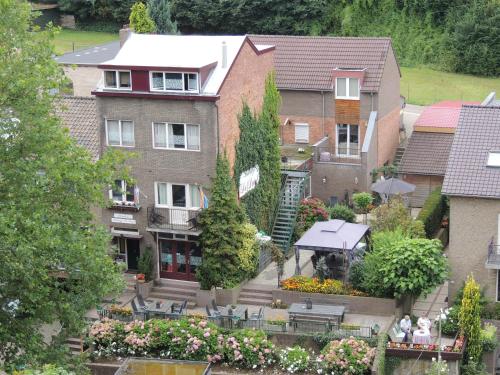 an aerial view of a house with a garden at Pension Auberge de Dael in Valkenburg
