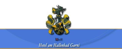 a figurine of two birds on a blue card at Am Hallenbad Hotel garni in Ratingen