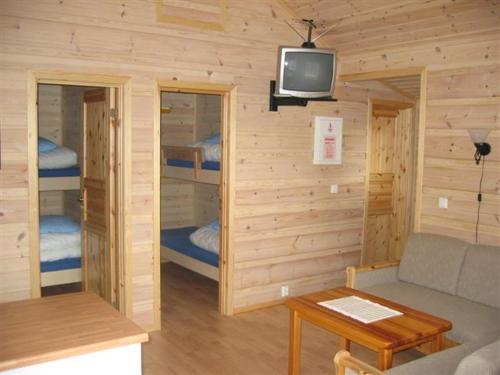 En eller flere senger på et rom på Røldal Hyttegrend & Camping