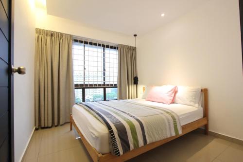 Cama o camas de una habitación en Vista Horizon Melaka
