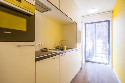 Una cocina o cocineta en Ooostel2.be Leuven