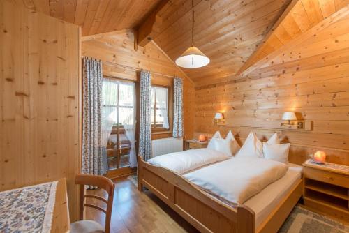 Posteľ alebo postele v izbe v ubytovaní Bio-Holzhaus und Landhaus Heimat