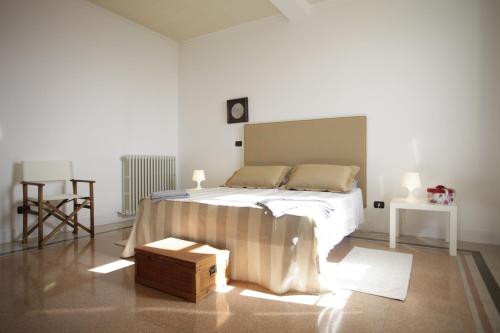 Cama ou camas em um quarto em Terrazza su Assisi Guest House