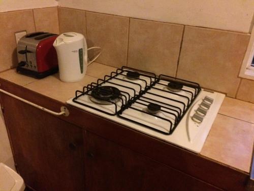 Kuchyň nebo kuchyňský kout v ubytování Raina Holiday Accommodation