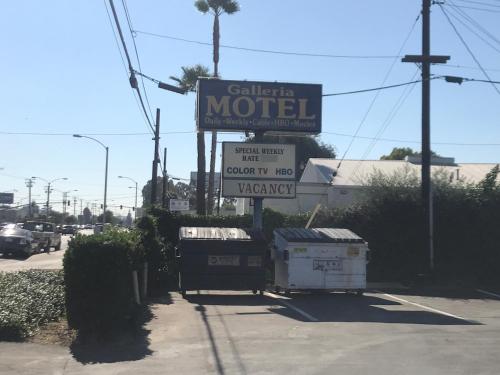 a motel sign on the side of a road at Galleria Inn Montclair/Ontario in Montclair