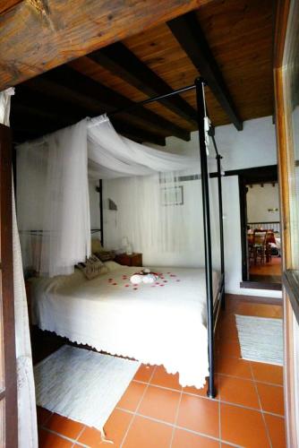 a bedroom with a large bed in a room at Irene's House in Kakopetria