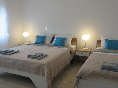 Postel nebo postele na pokoji v ubytování Apartman Otvoreno polje
